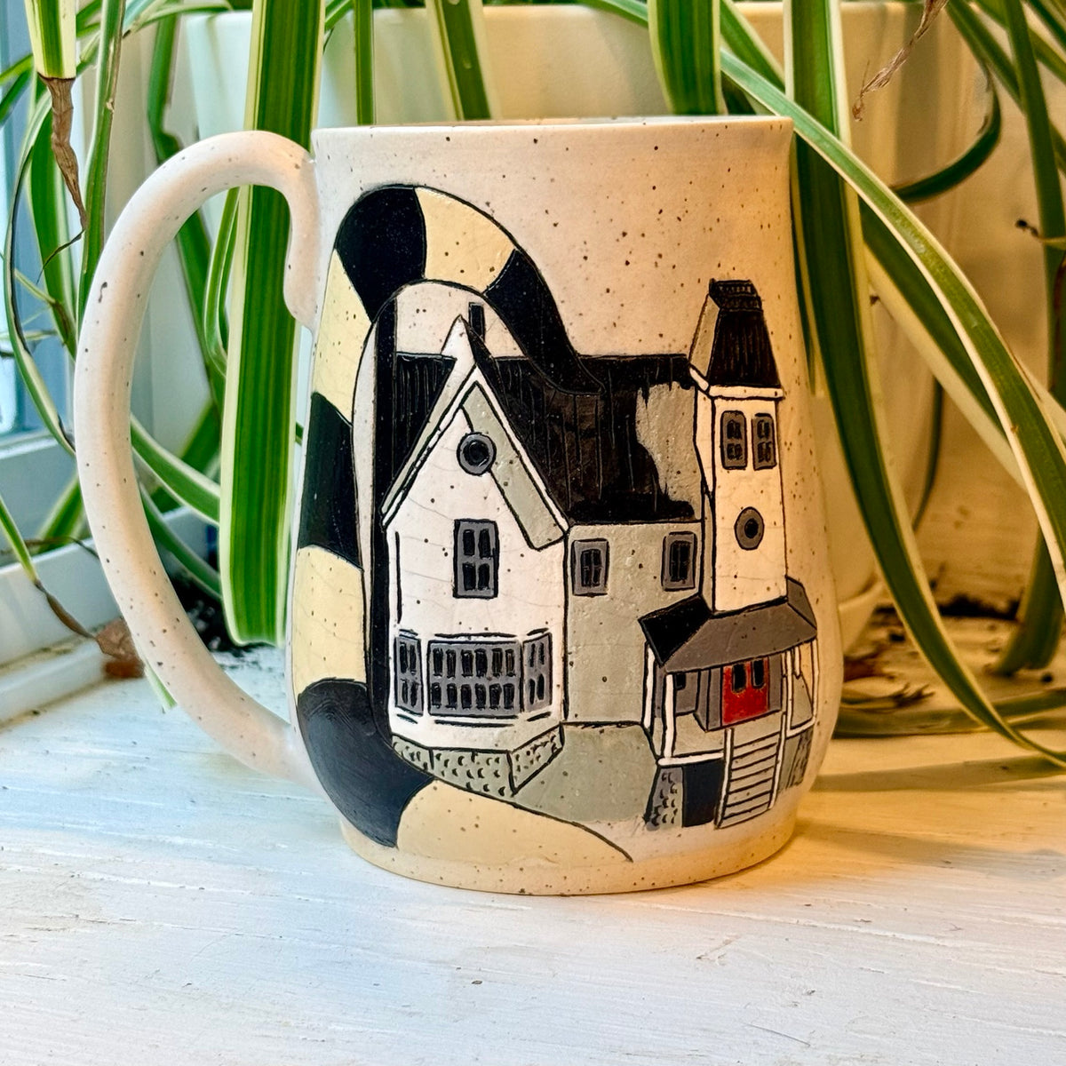 One-sided Beetlejuice house mug
