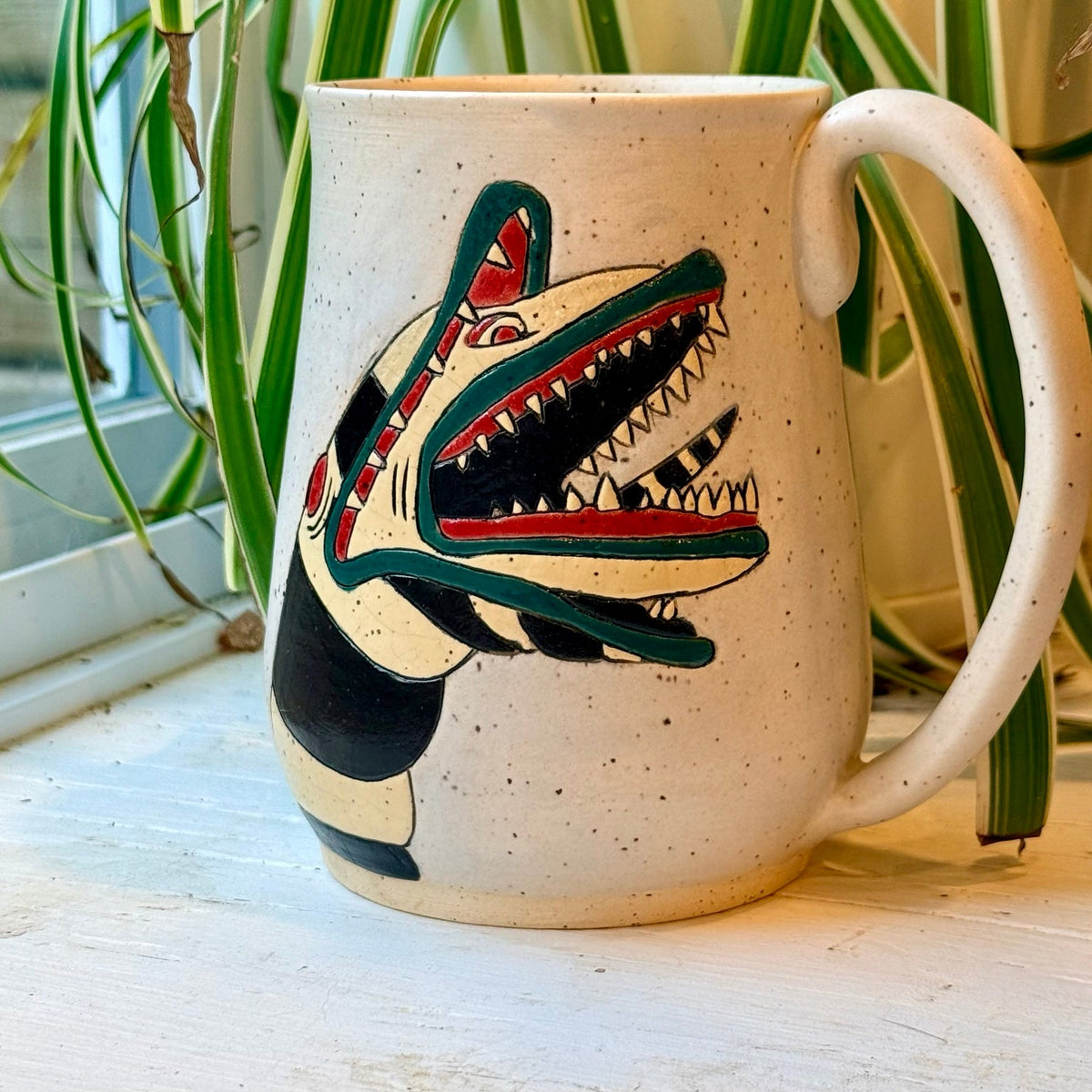 Beetlejuice wrap-around mug sandworm side